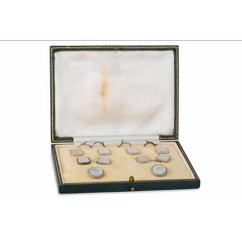 82 - A 1920'S WHITE GOLD STUD SET, mother of pearl inset, cased