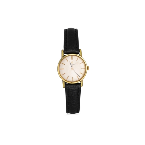 6 - A LADY'S OMEGA MANUAL GOLD PLATED WRISTWATCH, baton markers and leather strap