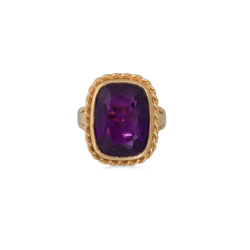 78 - AN ANTIQUE AMETHYST RING, the cushion cut amethyst mounted in gold, size M