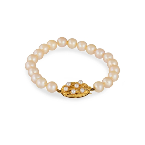 79 - A CULTURED PEARL BRACELET, with 18ct gold pearl set clasp