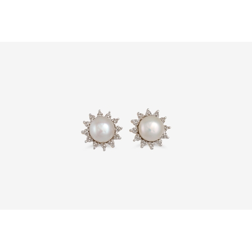 81 - A PAIR OF PEARL EARRINGS, mounted in white gold