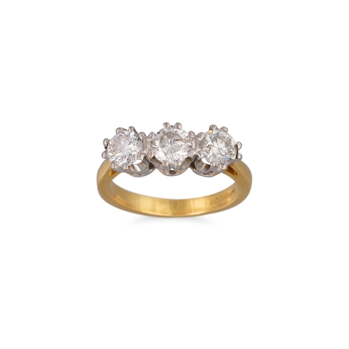 82 - A THREE STONE DIAMOND RING, the brilliant cut diamonds mounted in 18ct gold. Estimated: weight of di... 