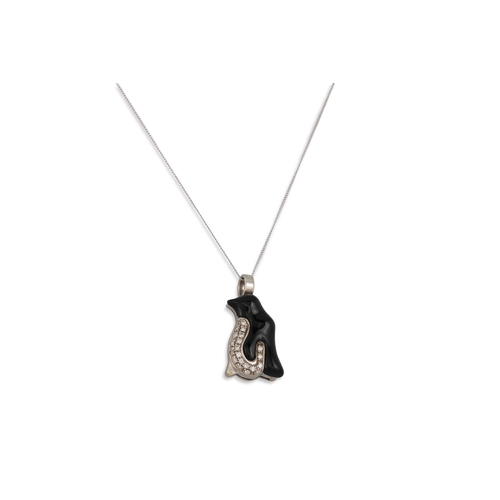 92 - A DIAMOND AND ONYX PENDANT, modelled as a penguin, mounted in 18ct white gold, on a chain