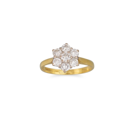 94 - A DIAMOND CLUSTER RING, the brilliant cut diamonds mounted in 18ct yellow gold. Estimated: weight of... 