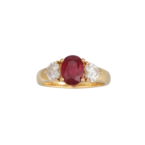 118 - A RUBY AND DIAMOND THREE STONE RING, the oval ruby to heart shaped diamond shoulders, mounted in 18c... 