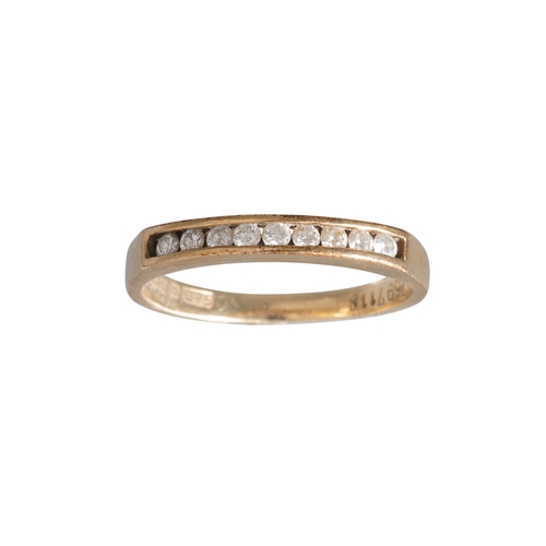 121 - A DIAMOND HALF ETERNITY RING, channel set with brilliant cut diamonds. Estimated: weight of diamonds... 