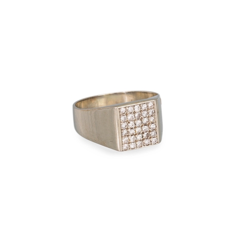 126 - A DIAMOND CLUSTER RING, of square form, mounted in gold, size K