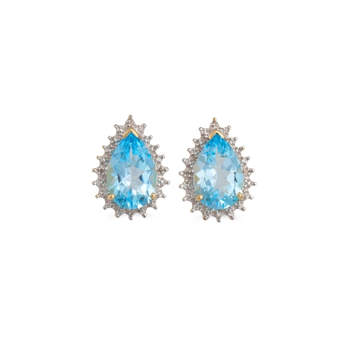 32 - A PAIR OF DIAMOND AND BLUE TOPAZ CLUSTER EARRINGS, the pear shaped topaz to diamond surround, mounte... 