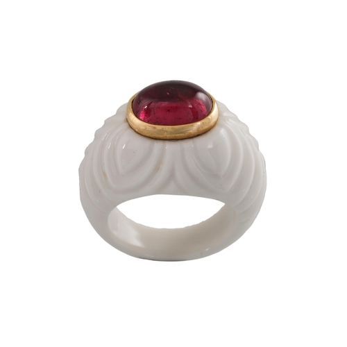 102 - A BVLGARI WHITE CERAMIC AND TOURMALINE BOMBÉ RING, mounted in 18ct gold, signed Bulgari, size K with... 