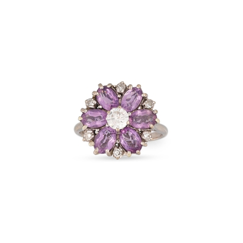 134 - AN AMETHYST AND DIAMOND FLORAL CLUSTER RING, mounted in 18ct white gold. Estimated: weight of diamon... 