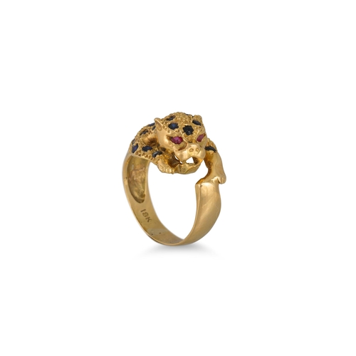 141 - AN 18CT GOLD LEOPARD RING, set with sapphires, size I