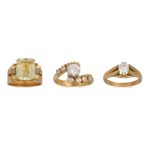 31 - THREE VARIOUS GOLD DRESS RINGS. Size: K, M, T