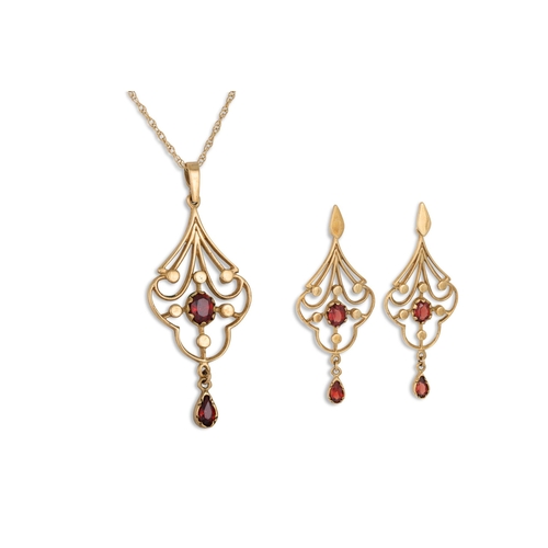 36 - A PAIR OF GARNET DROP EARRINGS, of shaped openwork form on a chain and matching pendant