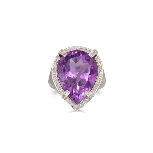 37 - AN AMETHYST AND DIAMOND CLUSTER RING, the pear shaped amethyst to diamond surround, mounted in 14ct ... 