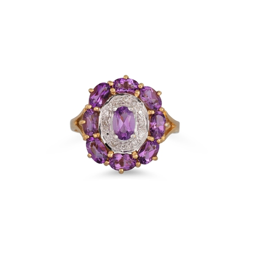 50 - AN AMETHYST AND DIAMOND CLUSTER RING, the oval amethyst to diamond surround and outer amethyst surro... 