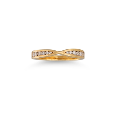 200 - A DIAMOND BAND RING, shaped form, channel set in 18ct yellow gold. Estimated: weight of diamonds: 0.... 