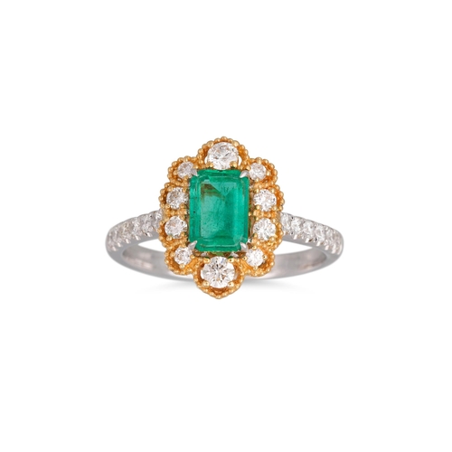 235 - AN EMERALD AND DIAMOND CLUSTER RING, the rectangular emerald to diamond surround and shoulders, moun... 