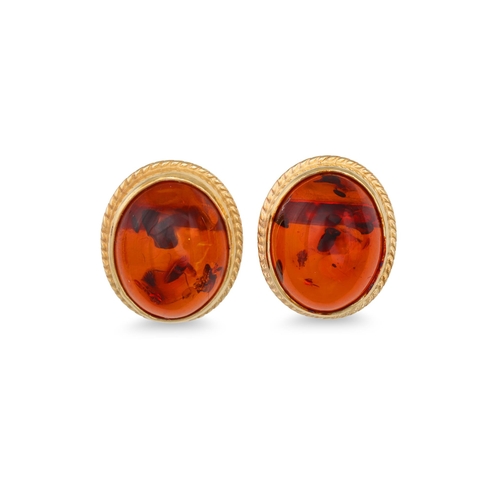 24 - A PAIR OF RESIN SET EARRINGS, the oval cabochon stones set in 9ct yellow gold