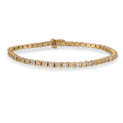 265 - A 14CT YELLOW GOLD DIAMOND SET BRACELET, 8 g.