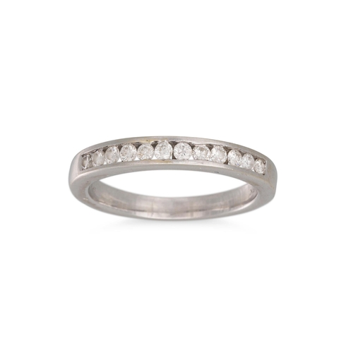 269 - A DIAMOND HALF ETERNITY RING, channel set brilliant cut diamonds in 14ct white gold. Estimated: 0.35... 