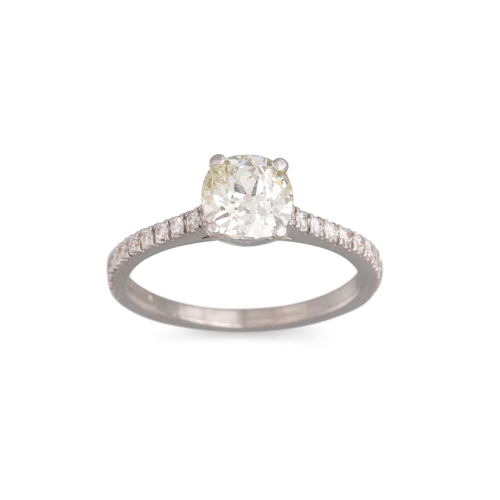 295 - A DIAMOND SOLITAIRE RING, the round brilliant cut diamond to diamond shoulders, mounted in white gol... 