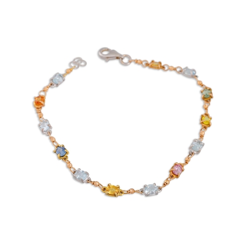 297 - A TOURMALINE, AQUAMARINE AND CITRINE BRACELET, mounted in yellow gold