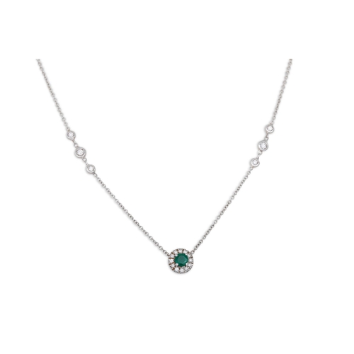 298 - AN EMERALD AND DIAMOND PENDANT, the circular emerald to diamond surround, mounted in white gold, on ... 