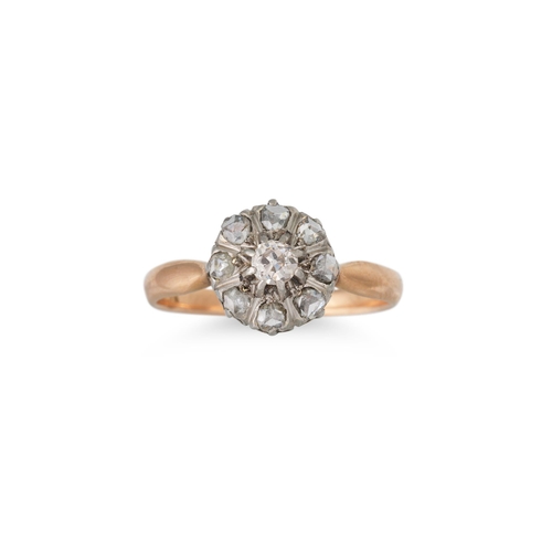 348 - AN ANTIQUE DIAMOND DAISY CLUSTER RING, the old cut diamonds mounted in gold, size M - N