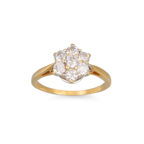 37 - A DIAMOND CLUSTER RING, the brilliant cut diamonds mounted in yellow gold, of daisy from. Estimated:... 