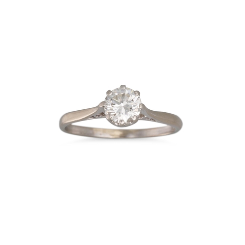 59 - A VINTAGE DIAMOND SOLITAIRE RING, the circular diamond mounted in 18ct gold & platinum. Estimated: w... 