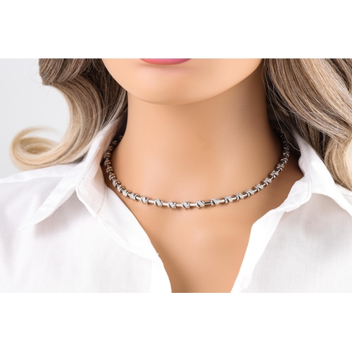 17 - A DIAMOND SET NECKLACE, fancy link, pavé set, mounted in white gold, 55 g.