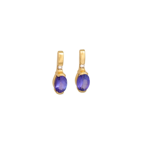 148 - A PAIR OF TANZANITE AND DIAMOND SET EARRINGS, mounted in 14ct yellow gold