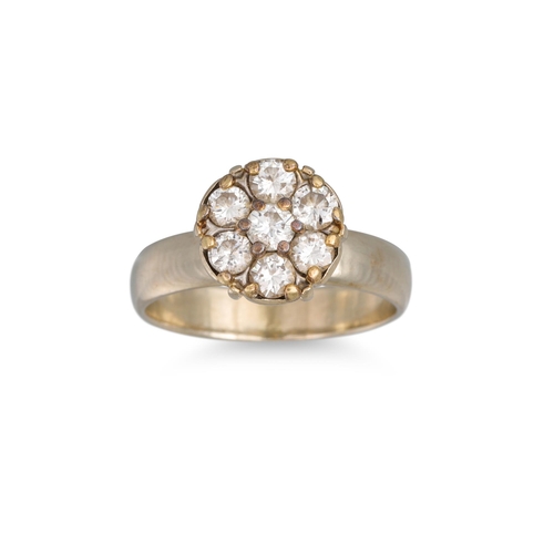 16 - A VINTAGE DIAMOND CLUSTER RING, circular form, mounted in white gold. Estimated: weight of diamonds:... 