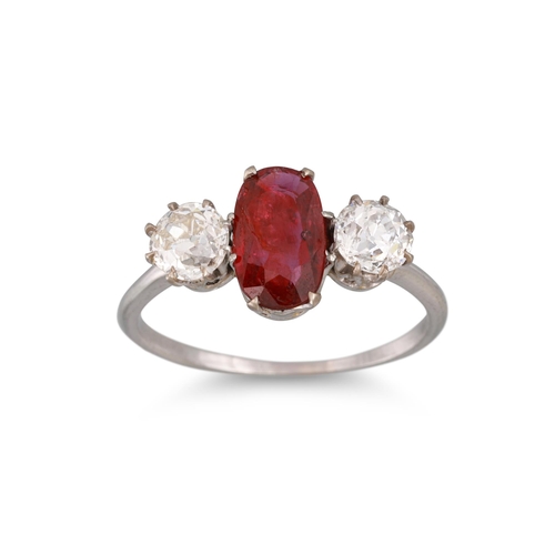 162 - A RUBY AND DIAMOND THREE STONE RING, the oval ruby to brilliant cut diamonds. Estimated: weight of d... 