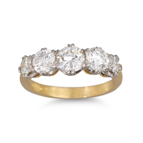 165 - A FIVE STONE DIAMOND RING, the brilliant cut diamonds mounted in 18ct yellow gold. Estimated: weight... 