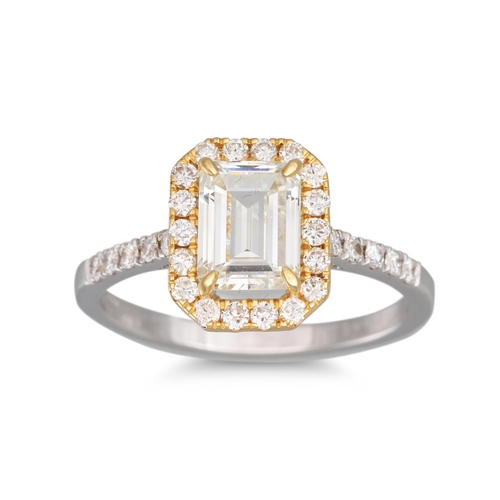 194 - A DIAMOND CLUSTER RING, the emerald cut diamond to halo surround and shoulders, mounted in 18ct whit... 