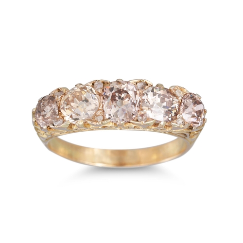 208 - A FIVE STONE DIAMOND RING, the old cut diamonds to a carved yellow gold mount. Estimated: weight of ... 