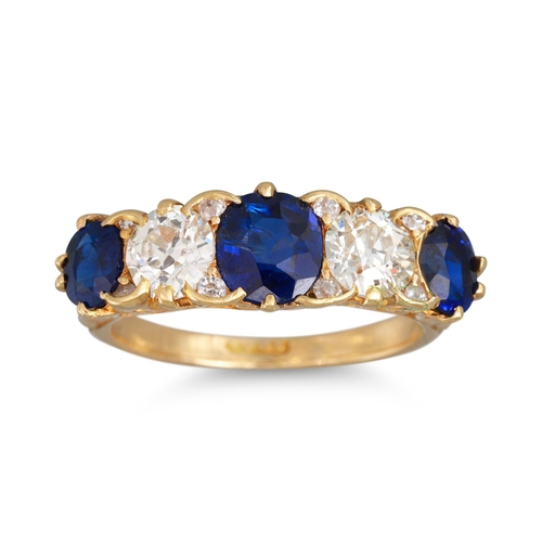 210 - A FIVE STONE DIAMOND AND SAPPHIRE RING, the oval sapphire and old cut diamonds, mounted in 18ct yell... 