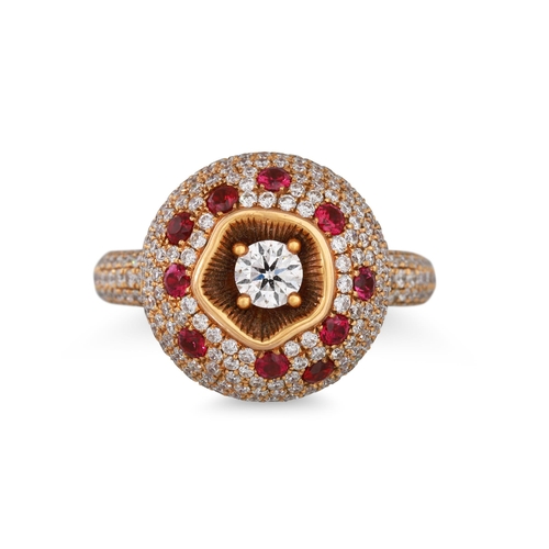 243 - A DIAMOND AND RUBY BOMBÉ CLUSTER RING, pavé set, mounted in 18ct yellow gold. Estimated: weight of d... 