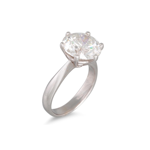 252 - A VERY FINE DIAMOND SOLITAIRE RING, the brilliant cut diamond mounted in 18ct white gold. Together w... 