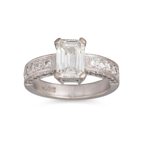 280 - A DIAMOND SOLITAIRE RING, the emerald cut diamond to diamond set shoulders, mounted in 18ct white go... 