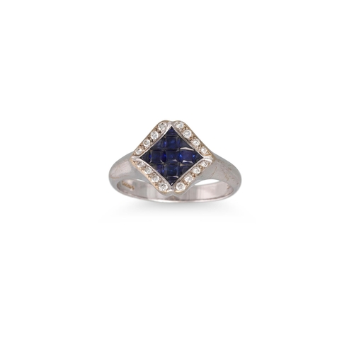 287 - A SAPPHIRE AND DIAMOND CLUSTER RING, mounted in white gold, set with French cut sapphires within a d... 