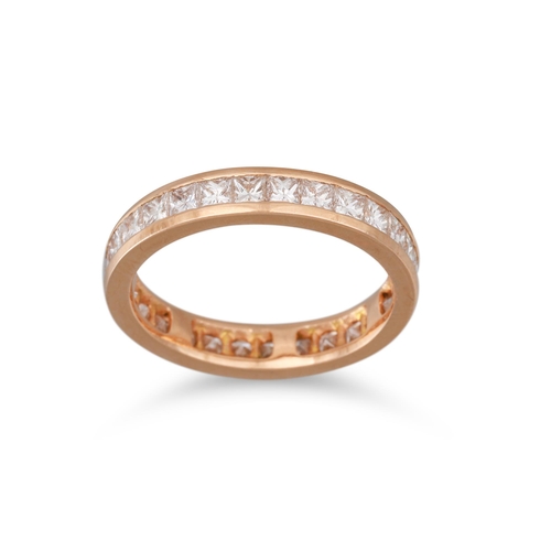 334 - A DIAMOND ETERNITY RING, the princess cut diamonds mounted in yellow gold, size J