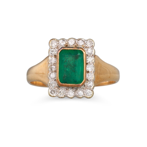 343 - AN EMERALD AND DIAMOND CLUSTER RING, of rectangular form, mounted n yellow gold, size M