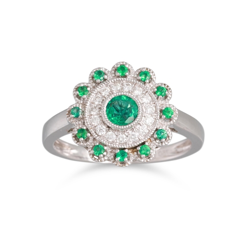 64 - A DIAMOND AND EMERALD CLUSTER RING, the round emerald to a diamond surrounds, floral form, size N - ... 