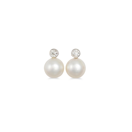 14 - A PAIR OF SOUTH SEA PEARL AND DIAMOND EARRINGS, mounted in 18ct white gold. Estimated: weight of dia... 