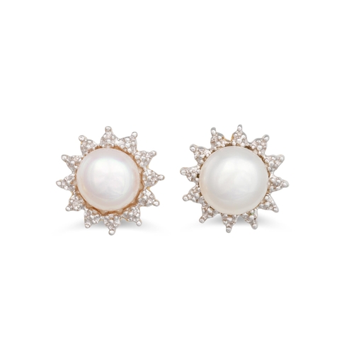 28 - A PAIR OF DIAMOND AND PEARL EARRINGS, mounted in 9ct white gold