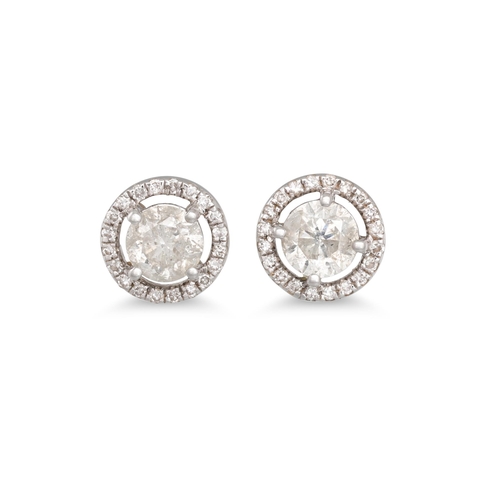 58 - A PAIR OF DIAMOND HALO CLUSTER EARRINGS, mounted in white gold. Estimated: weight of diamonds: 1.00 ... 