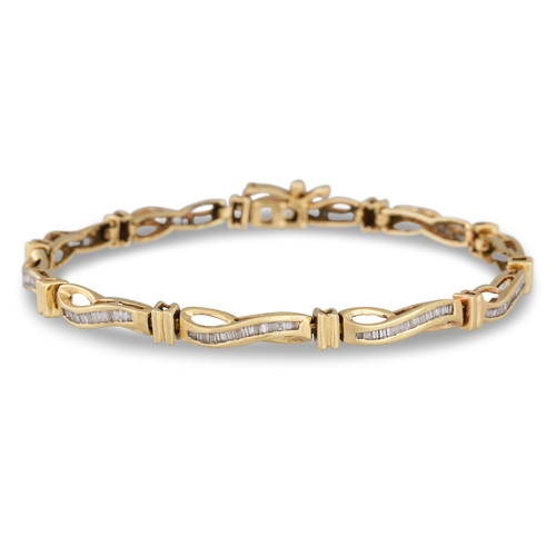 59 - A DIAMOND LINE BRACELET, channel set with baguette cut diamonds, mounted in 10ct gold