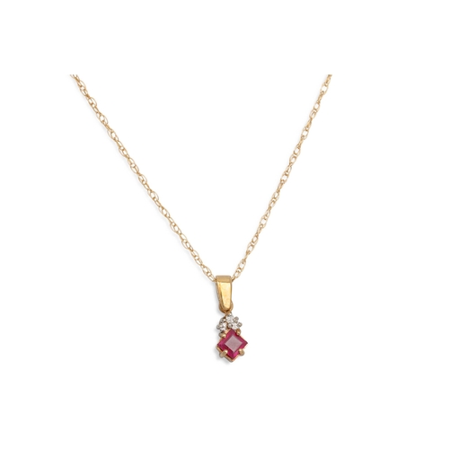 113 - A RUBY AND DIAMOND SET PENDANT, mounted in 9ct yellow gold on a gold chain